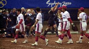Dejected Japanese players walk off field
